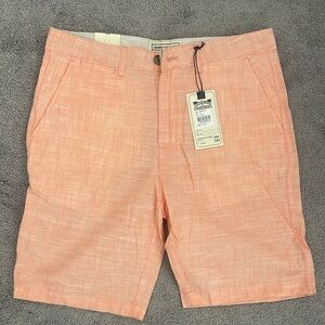 Orange men’s shorts brand new size 33